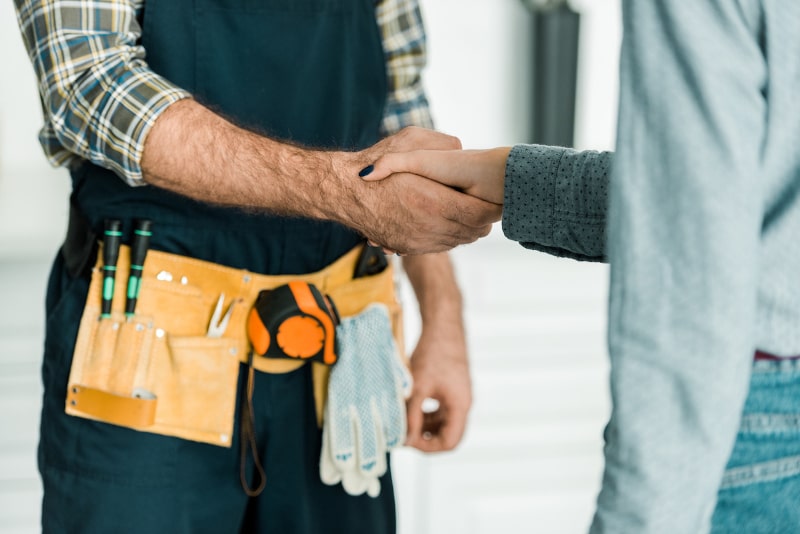 Garage Door Problems in Canton, MIlient wear a tool belt